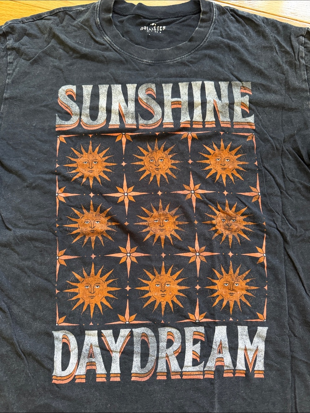 Hollister Oversized Black Graphic Tee with Orange Sun Grid 'Sunshine Daydream'